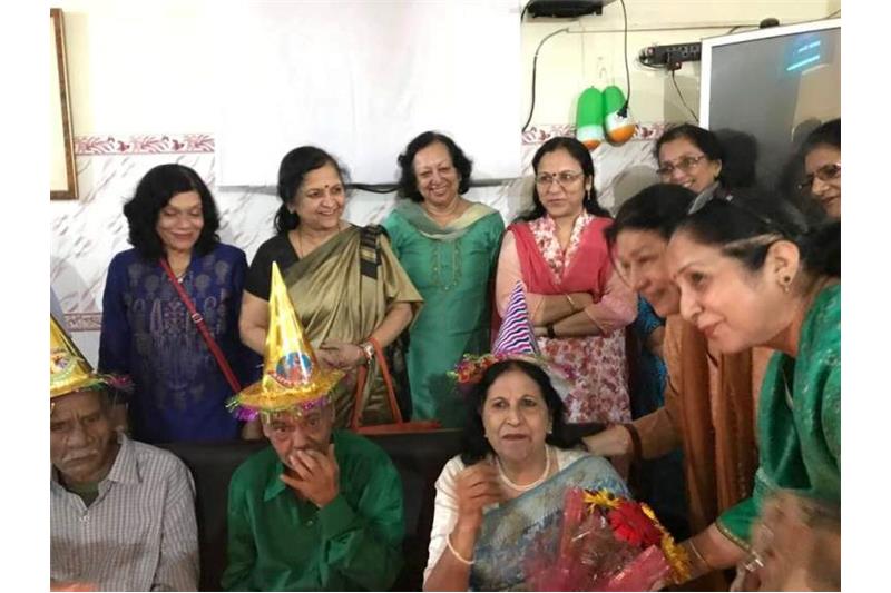 Celebrating Birthday of the Cheshire Home residents with Ms Indira Gupta.