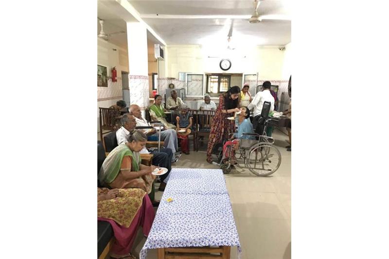 Rupal celebrating Birthday with the residents of Cheshire Home
