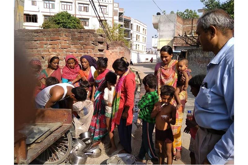 Distribution of old clothes and utensils in our Neighborhood 