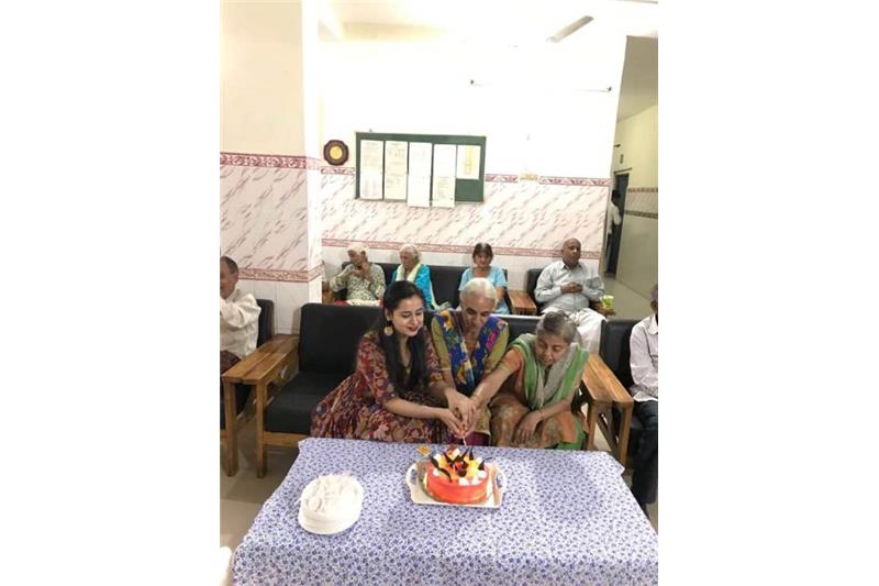 Rupal celebrating Birthday with the residents of Cheshire Home