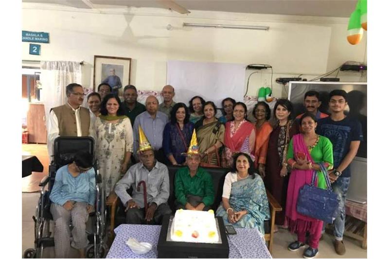 Celebrating Birthday of the Cheshire Home residents with Ms Indira Gupta.