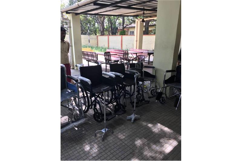 Ms Neelam Khandelwal and Ms Sarita Bagel & the family donated wheel chairs and other aids