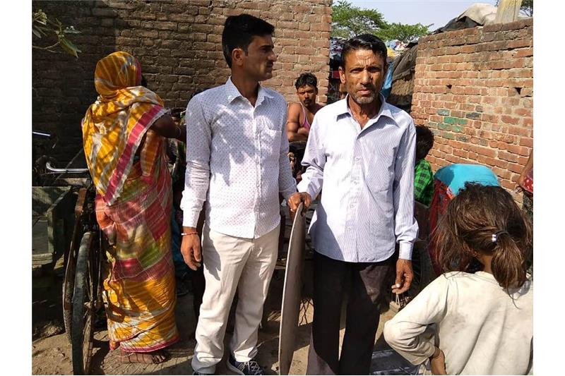 Distribution of old clothes and utensils in our Neighborhood 