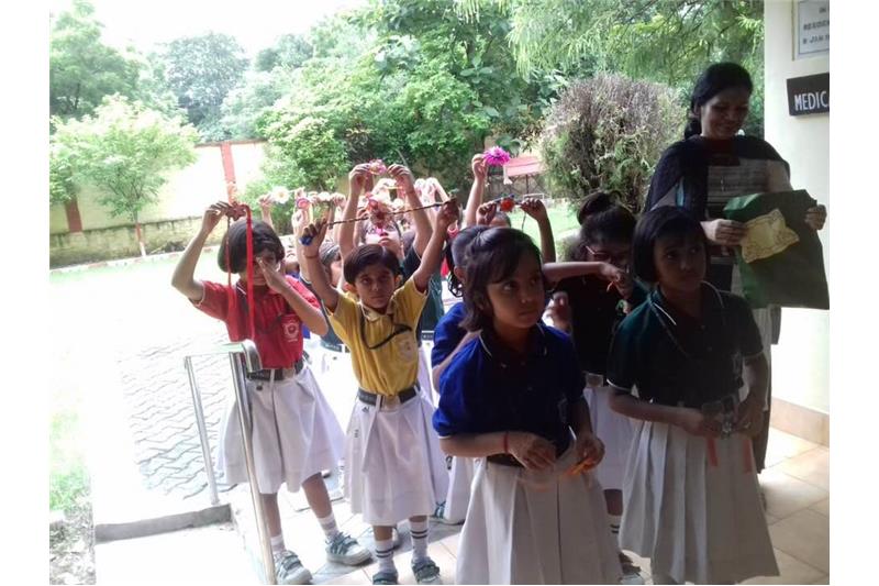 Children from DPS Eldeco visited the Cheshire Home today to celebrate Rakhi 