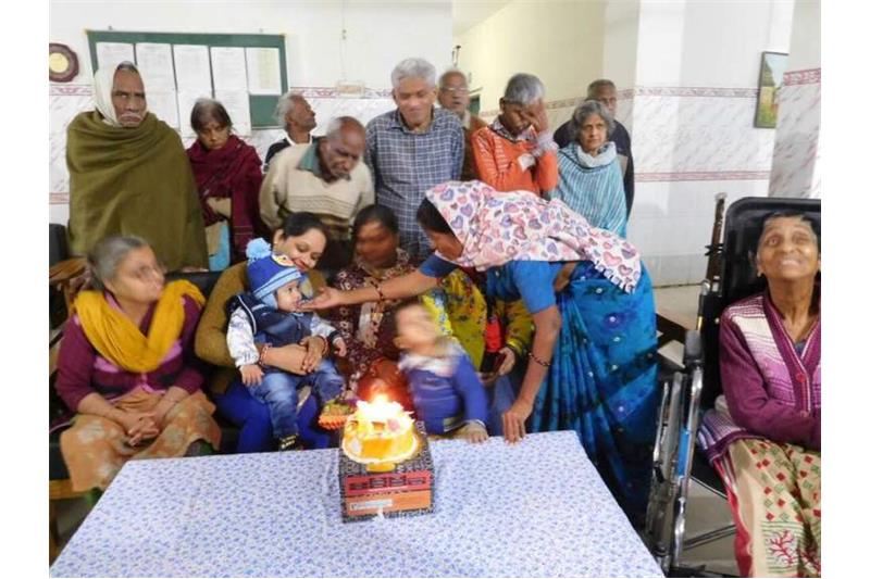 Birthday celebrations of a lovely one year child with the residents of Cheshire Home today.