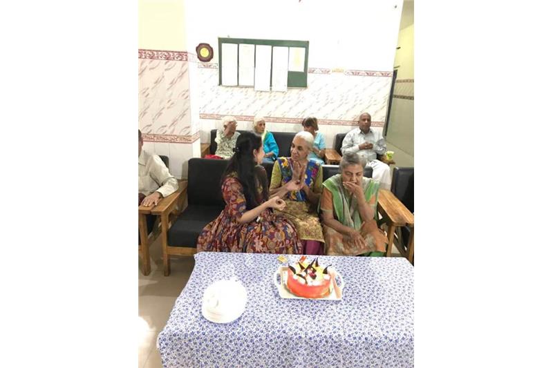Rupal celebrating Birthday with the residents of Cheshire Home